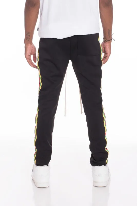 RASTA MON TAPED TRACK PANTS