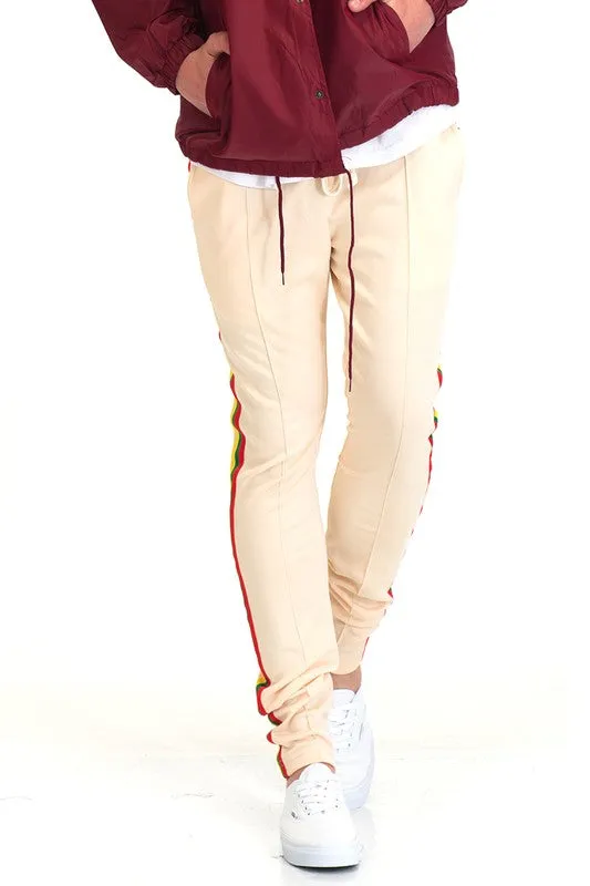 RASTA MON TAPED TRACK PANTS